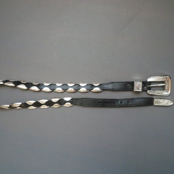 SIZE 28. Justice women\'s genuine leather metal braided belt.